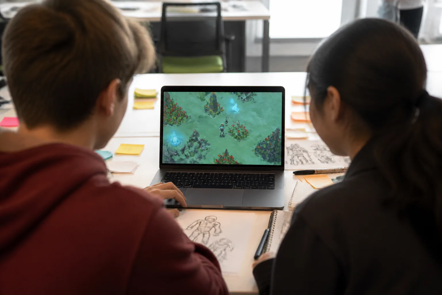 Students playtesting a game together